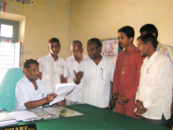Madnoor Tahasildar going through Memorandum.
